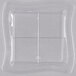A clear plastic square tray with four sections.