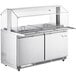 An Avantco stainless steel refrigerated salad bar with a sneeze guard and tray slide.