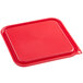 A red square Carlisle food storage container lid on a red square container.