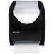 A black and stainless steel San Jamar Tear-N-Dry paper towel dispenser.