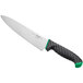 A Schraf chef knife with a green handle.