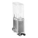 A Vollrath silver refrigerated beverage dispenser with a clear container.
