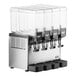 A Vollrath refrigerated beverage dispenser with four clear containers.