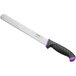 A Schraf serrated slicing knife with a black blade and purple handle.