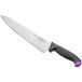 A Schraf chef knife with a purple handle.