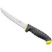 A Schraf 6" serrated utility knife with a yellow handle and black blade on a counter.