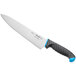 A white Schraf chef knife with a blue TPRgrip handle.