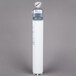 A white Manitowoc Arctic Pure water filtration system cylinder with a gauge on top.
