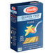 A blue box of Barilla gluten-free penne pasta.