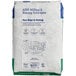 A white bag of ADM All Purpose Flour with blue and green text.