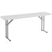 A white rectangular National Public Seating plastic folding table with silver legs.