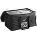 A black Vollrath insulated food pan carrier bag with a silver lid.