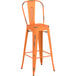 A Lancaster Table & Seating distressed orange metal barstool with a backrest.