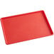 A red Choice bakery display tray with a textured surface.