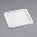 A white square Vigor polypropylene food storage container lid.