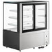 An Avantco dry bakery display case with a black and silver base and three glass shelves.