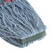A close up of a Rubbermaid blue blend wet mop head with a 1" headband.