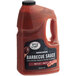 A jug of Sauce Craft Applewood Smoked Bacon BBQ Sauce on a table.