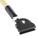 A black and white Rubbermaid hardwood dust mop handle with a white plastic tip and black metal clip.