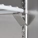 An Avantco worktop freezer metal shelf with a white rod.