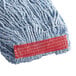 A close-up of a blue Rubbermaid wet mop with red trim.