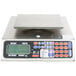 A Tor Rey 10 lb. table top counting scale with buttons and a digital screen.