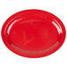 A red oval platter with a white background.