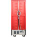 A red Metro C5 heated holding cabinet with a white cable tied to it.
