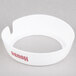 A white circular Tablecraft salad dressing dispenser collar with maroon lettering.