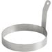 A Choice stainless steel egg ring with a handle.