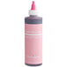 A Chefmaster Bakers Rose food coloring bottle with a pink cap.
