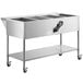 An Avantco stainless steel mobile electric steam table with an undershelf and four containers on a counter.