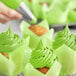 Cupcakes with green Chefmaster Liqua-Gel frosting.