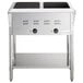 An Avantco stainless steel open well electric steam table with two pans on a counter.