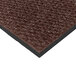 A brown Berber carpet mat with black trim.
