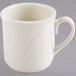 A white Homer Laughlin China mug with a handle.