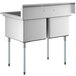 A Regency stainless steel two compartment commercial sink with galvanized steel legs on a counter.