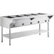 A large stainless steel ServIt electric steam table with adjustable undershelf.