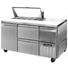 A stainless steel Continental Refrigerator sandwich prep table with two drawers.