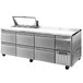 A Continental Refrigerator stainless steel refrigerated sandwich prep table with six drawers.