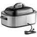 A black and silver Proctor Silex electric countertop roaster with a cord.