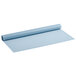 A blue rolled up silicone work mat.