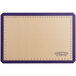 A rectangular white and purple Baker's Mark silicone baking mat with purple border and measurements.
