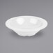 A white GET Diamond White melamine bowl.