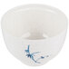 A white melamine bowl with blue and white bamboo design.