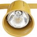 An Avantco gold countertop heat lamp with two round yellow lights.