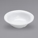 An American Metalcraft Jane Collection white melamine bowl with a narrow rim on a gray surface.