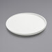 An American Metalcraft white coupe melamine plate on a gray surface.