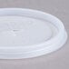 A close-up of a white plastic Cambro lid with a hole in it.