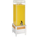 A Cal-Mil square beverage dispenser with a yellow liquid and white metal and wood base.